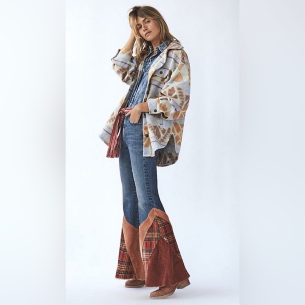 Free People Corduroy Patchwork Denim. Flared legs. Size 29
New w/tags
